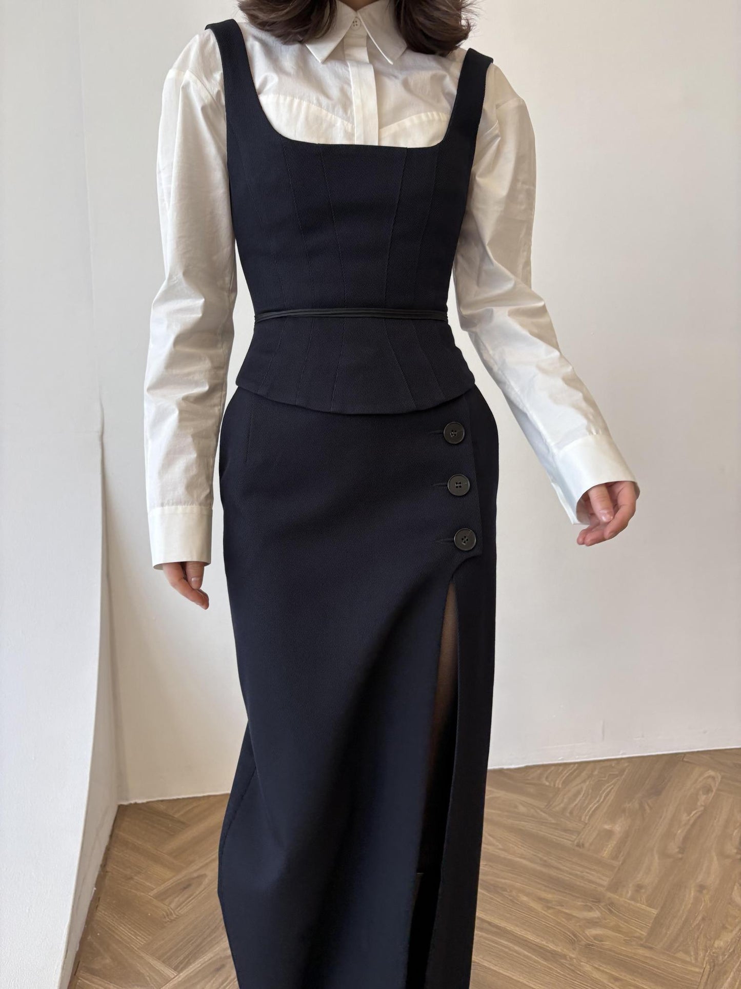 Navy blue asymmetrical button-down skirt, corset, and shirt three-piece set